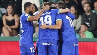 Getafe players celebrate a goal